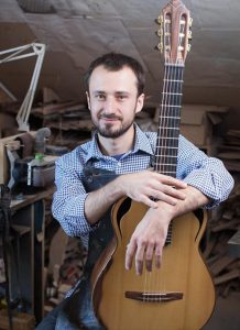 Piotr Nowak with his handmade guitar