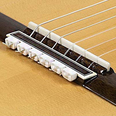 classical guitar with white guitar beads
